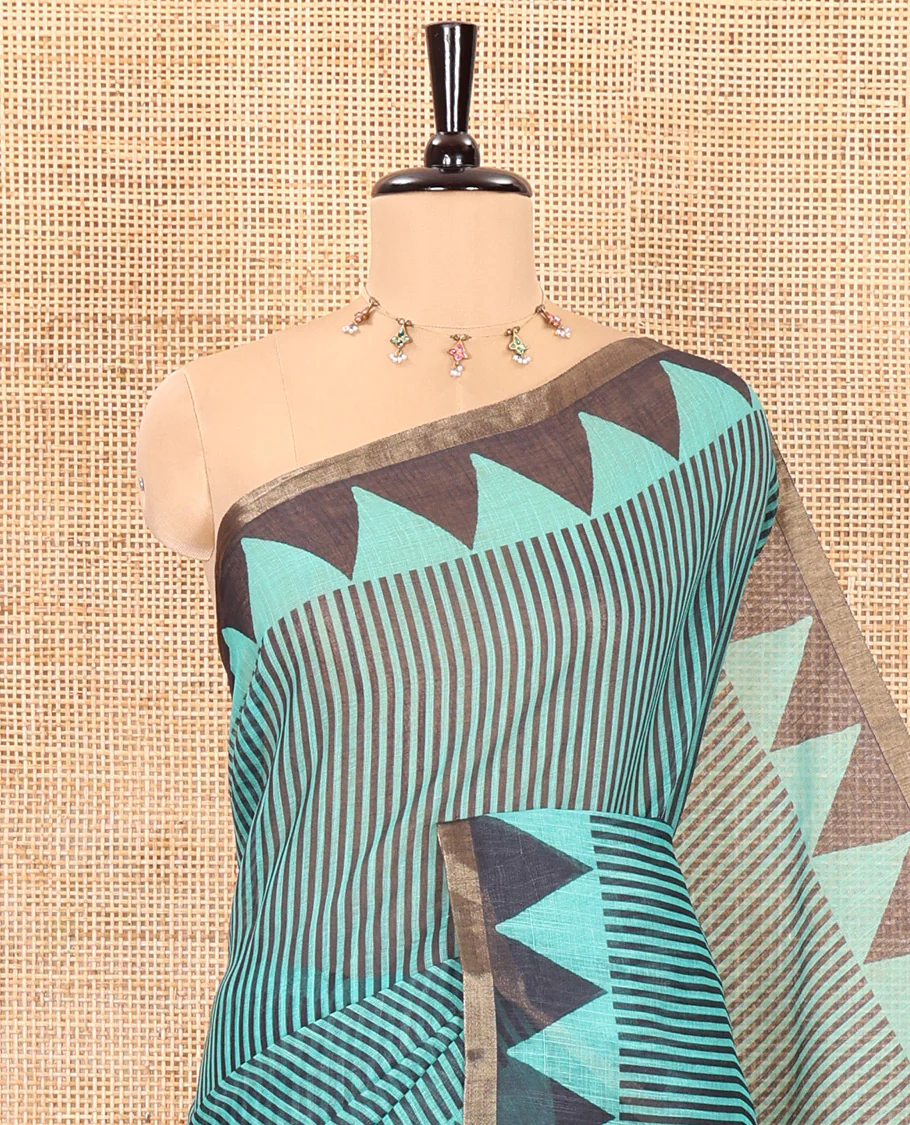 Green vertical stripes printed linen cotton saree, a temple-printed border, big polka dot printed pallu, and a printed blouse - Image 2