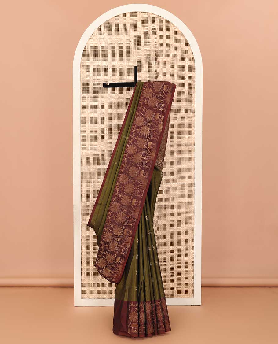 Green warli motifs woven Mayuri soft silk saree, contrast warli-village theme woven border, and pallu of floral and warli-village theme designs