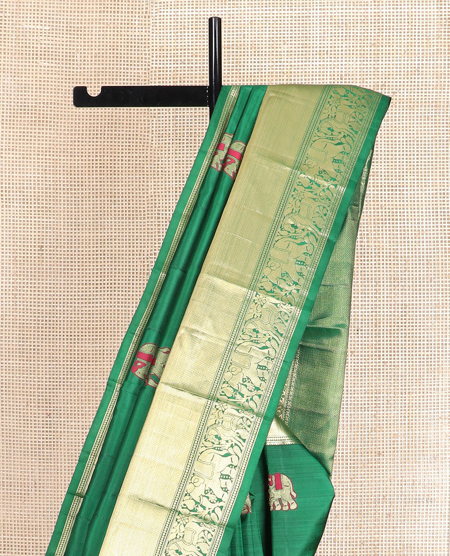 Green yaanai and kuthirai thread buttas Vasundhara silk saree, zari border of rekku, diamond, mayil kann, kuthirai, and yaanai designs, and jaal pallu - Image 3