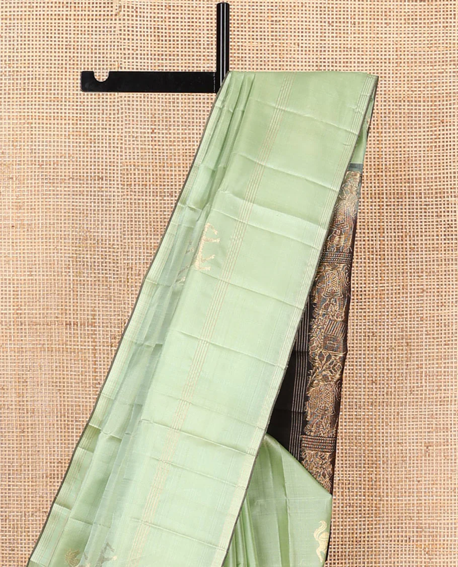 Green yaanai buttas Mayuri soft silk saree, zari striped border, and contrast yaanai and house motifs woven pallu - Image 3