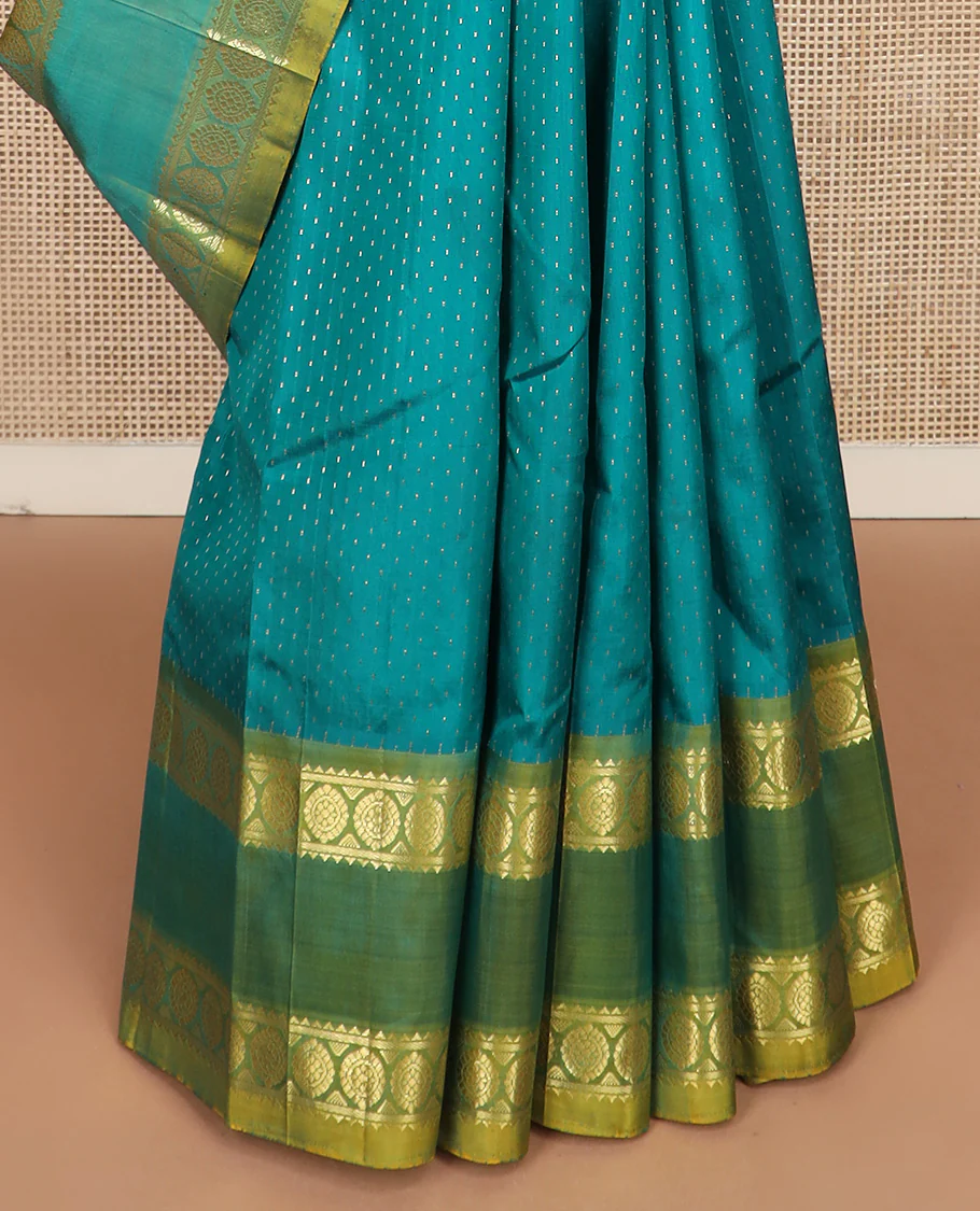 Green zari buttas Kanchipuram silk saree, contrast one-sided rettai pettu border of rekku and poo chakram, and zari design pallu - Image 5