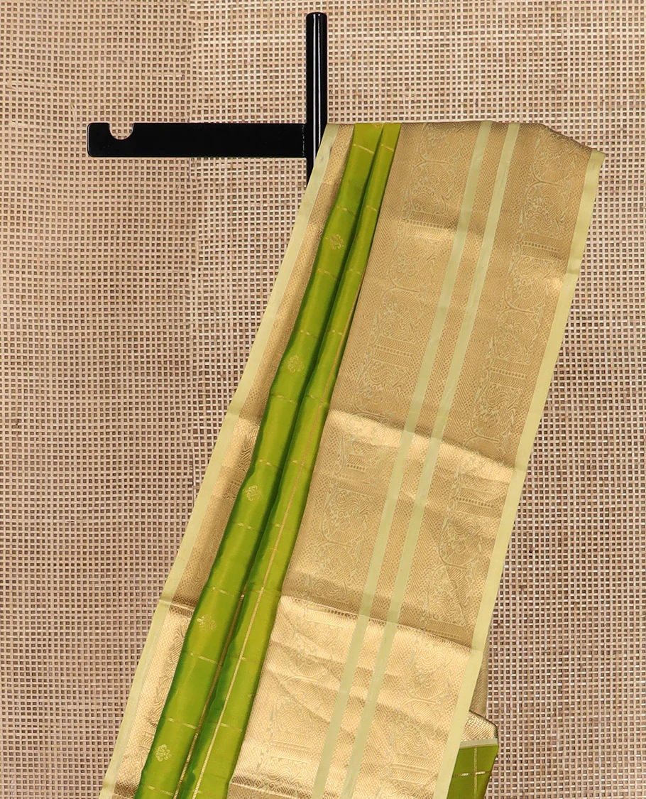 Green zari design Vasundhara silk saree, contrast border of kuyil kann, banaras, and mayil designs, and ogee patterned pallu - Image 4