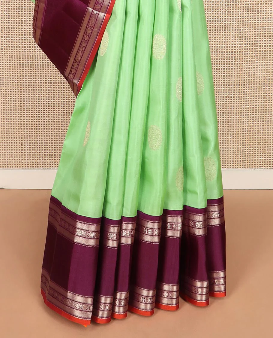 Green zari buttas Vasundhara silk saree, contrast rettai pettu border of banaras, meen and rudraksham designs, and geometric patterned pallu - Image 4