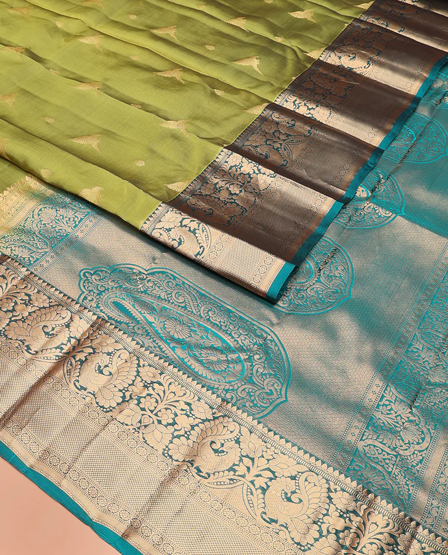 Green zari buttas Vasundhara Lite Silk Mix Saree, contrast border of thilakam mokku, muthu, mayil, laddu kamalam, and kuyil kann designs, and pallu of paisleys - Image 2