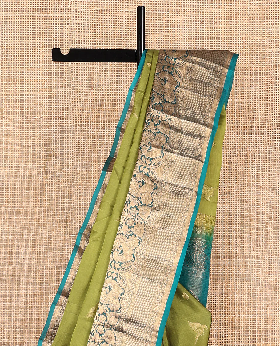 Green zari buttas Vasundhara Lite Silk Mix Saree, contrast border of thilakam mokku, muthu, mayil, laddu kamalam, and kuyil kann designs, and pallu of paisleys - Image 3