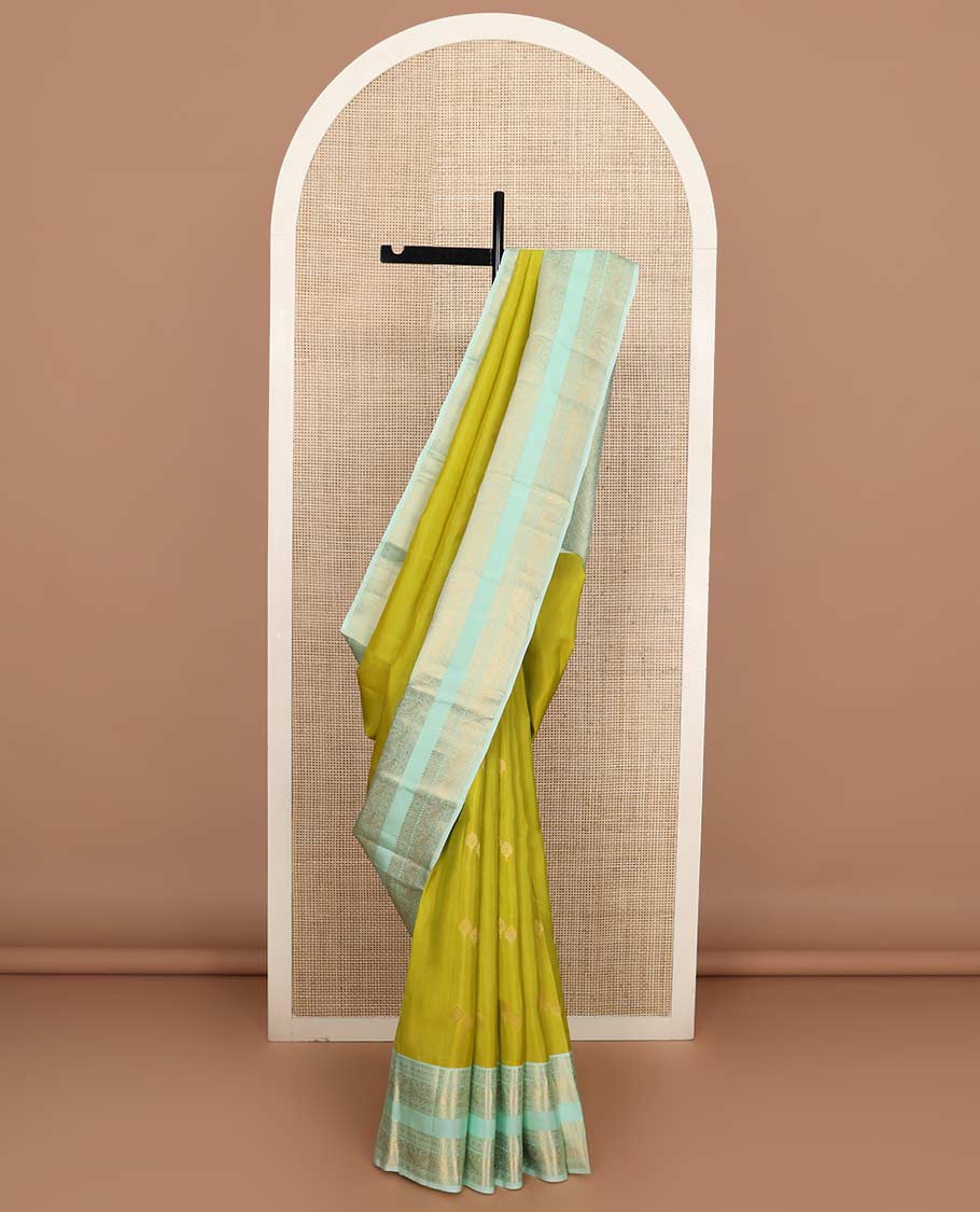 Green zari buttas Vasundhara Lite Silk Mix Saree, contrast rettai pettu border of rekku, rudraksham, and mayil designs and zari rich jaal pallu