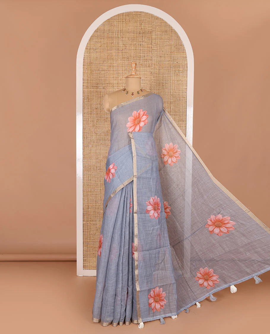 Grey daisy floral printed linen cotton saree, gold zari piping border, daisy floral printed pallu, and matching floral printed blouse