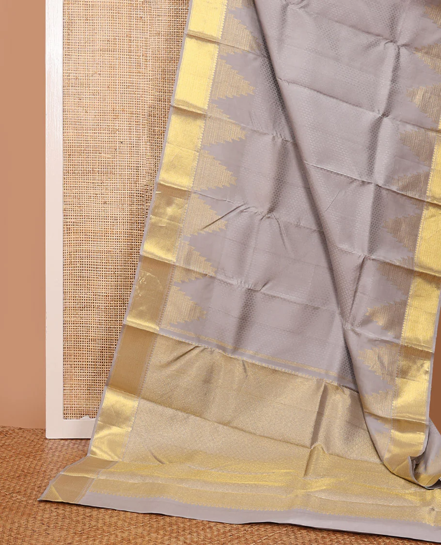 Grey embossed Parampara silk saree, thazampoo rekku golden zari border of thilakam mokku, muthu, and vanki designs, and zari rich jaal pallu - Image 3
