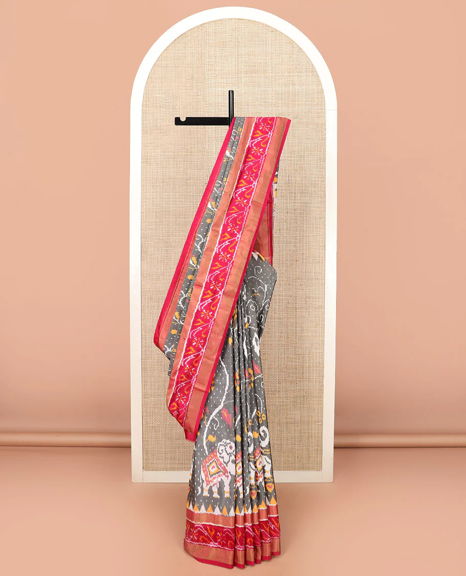 Grey Ikkat Silk Saree Decked Up with Elephant Motifs in Ikkat Weave, Complemented by a Contrast Temple Border, Pallu Woven in Intricate Ikkat Designs, and a Contrast Blouse - Image 2