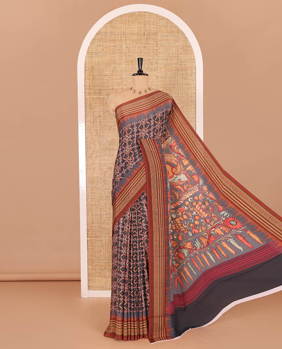 Grey patola style geometric printed Italian Crepe saree, contrast temple ikkat printed border, Kalamkari printed pallu, and a printed bordered blouse