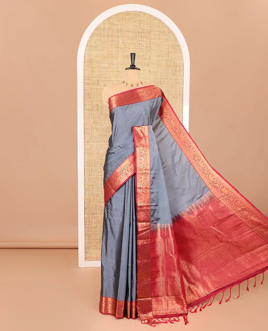 Grey plain luxury soft silk saree, contrast traditional temple zari border of elephant motifs, geometric zari pallu, and a contrast jacquard blouse