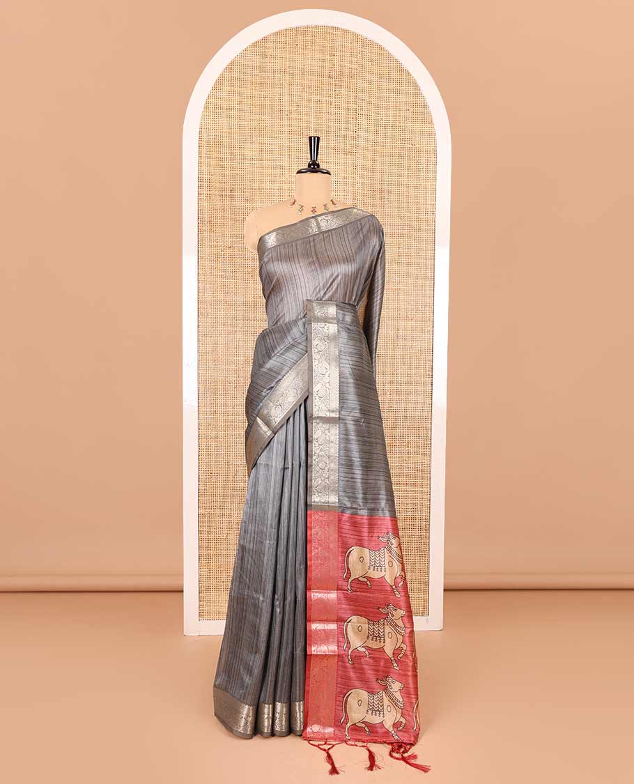 Grey striped semi-tussar saree, traditional zari border of floral creeper designs, contrast pallu of Pichwai cow print, and contrast Pichwai cow printed blouse - Image 2