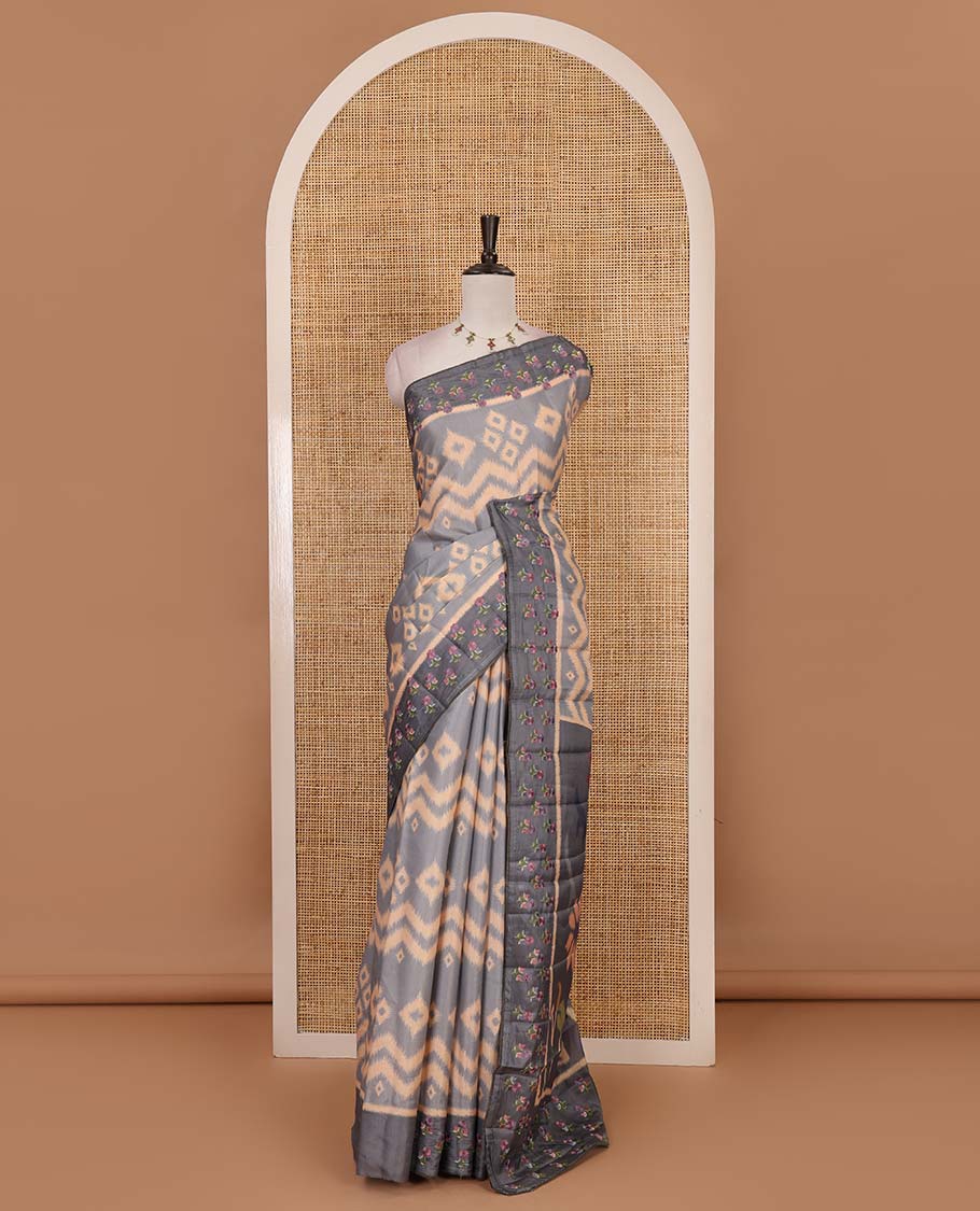 Grey pochampally ikkat style geometric printed fancy tussar saree, contrast floral motifs thread embroidered border, ikkat printed pallu, and plain blouse - Image 2