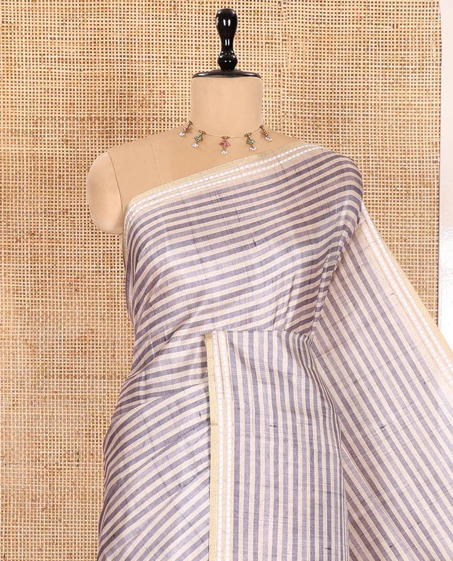 Grey Semi-Tussar Saree Featuring Horizontal Stripe Prints, Accentuated by a Subtle Resham Thread Temple-Designed Border, with a Pallu Highlighted by Intricate Circular Motifs, Paired with a Contrast Bandhani Blouse - Image 2