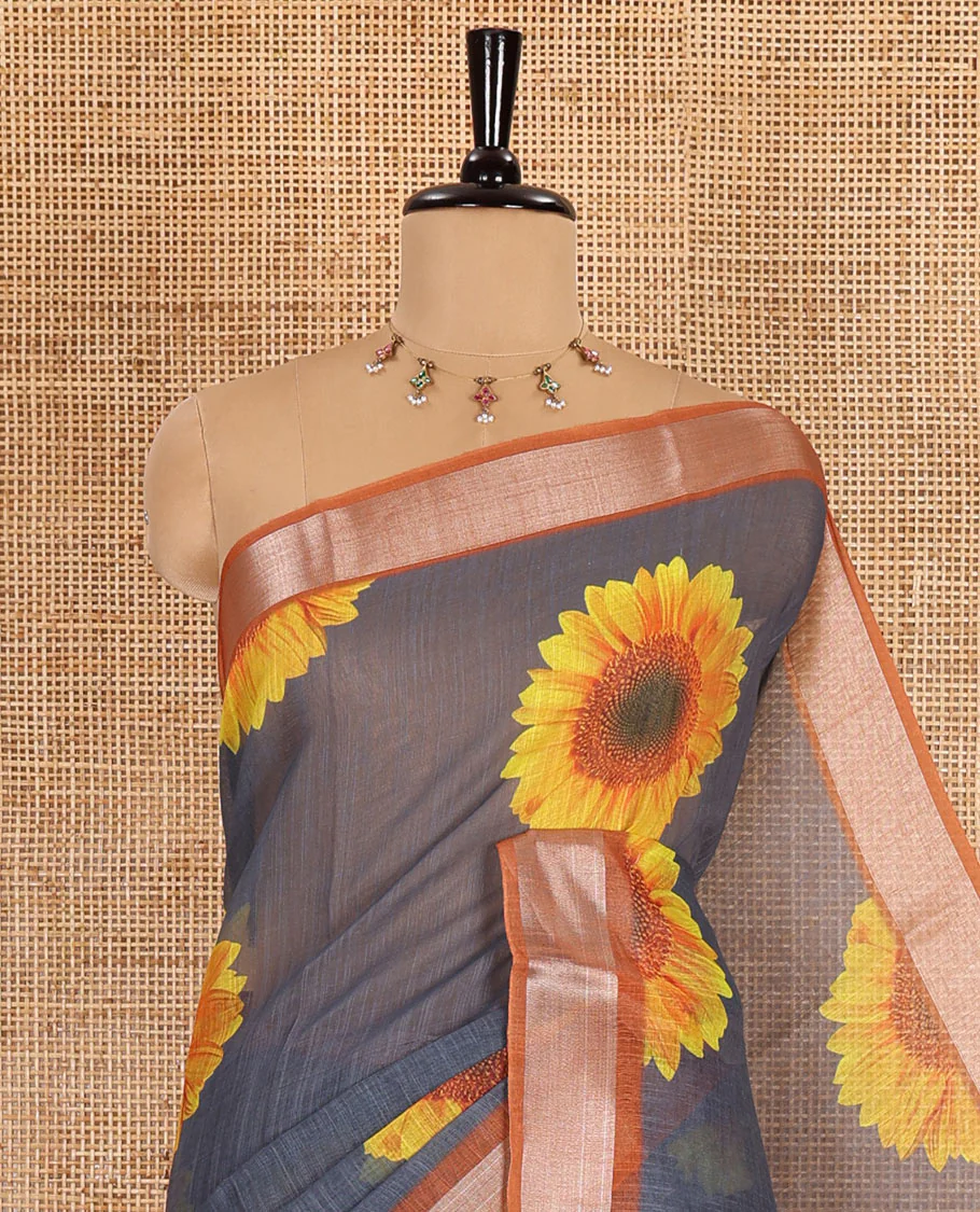 Grey sunflower motifs printed linen cotton saree, contrast zari border, sunflower motifs printed pallu, and contrast temple printed blouse - Image 2