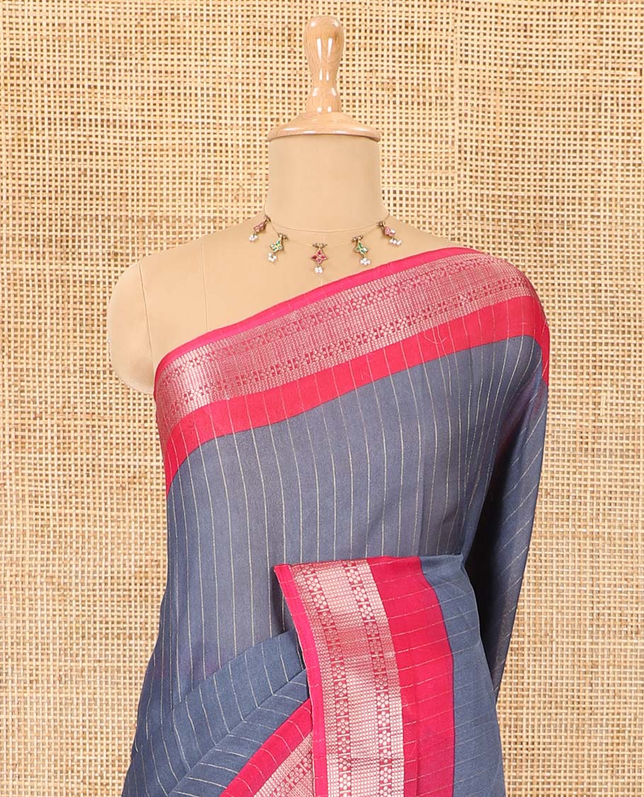 Grey vertically striped moss chiffon saree with contrast traditional zari design borders, striped pallu, and a contrast blouse - Image 3
