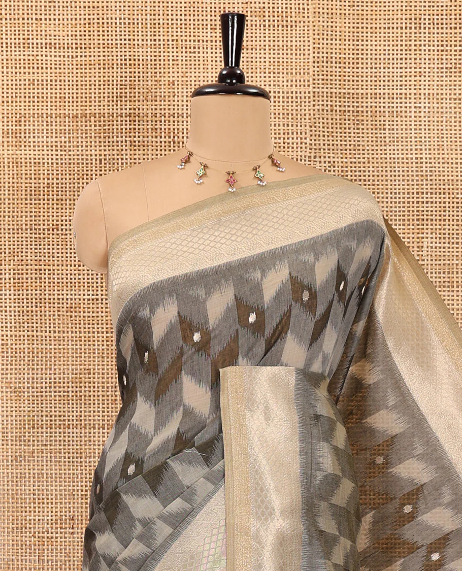 Grey zig-zag style ikkat design with buttas Munga cotton saree, zari jacquard blouse, ogee patterned pallu, and a contrast border of thread and zari buttas - Image 2