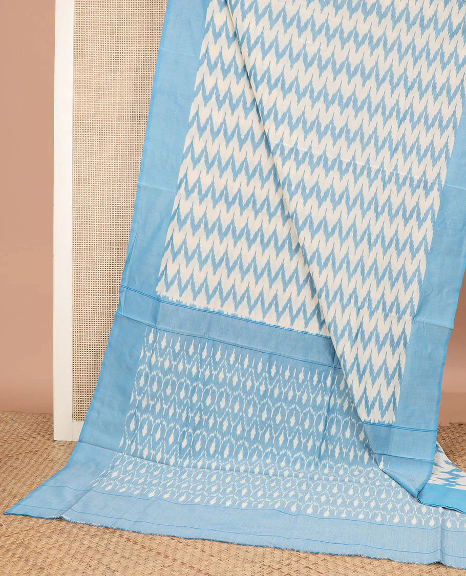 Half-White and Blue Ikkat Cotton Saree Enthralled with Chevron Stripes, Complemented by a Contrast Border, and Pallu of Ikkat Jaal Patterns - Image 2