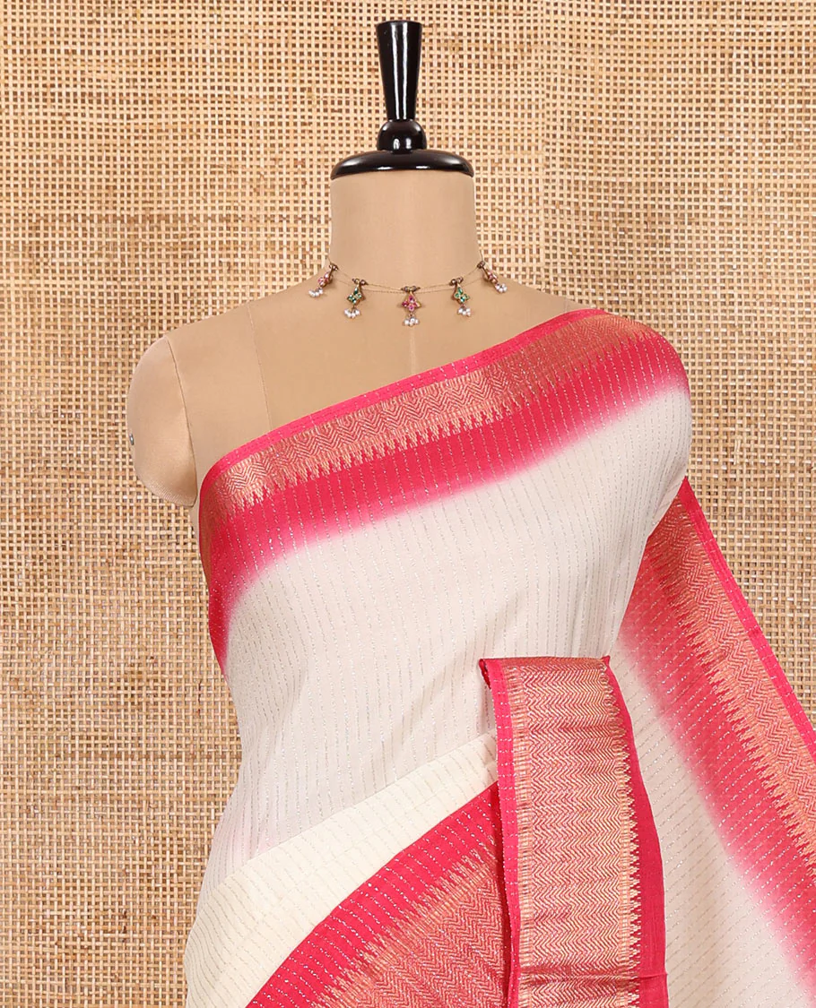 Half-White Dola Silk Saree Adorned with Vertical Golden Stripes Running All Over Its Body, Complemented by a Contrast Traditional Zari Design Woven Border, Subtly Striped Pallu, and a Contrast Buttas Woven Blouse - Image 2