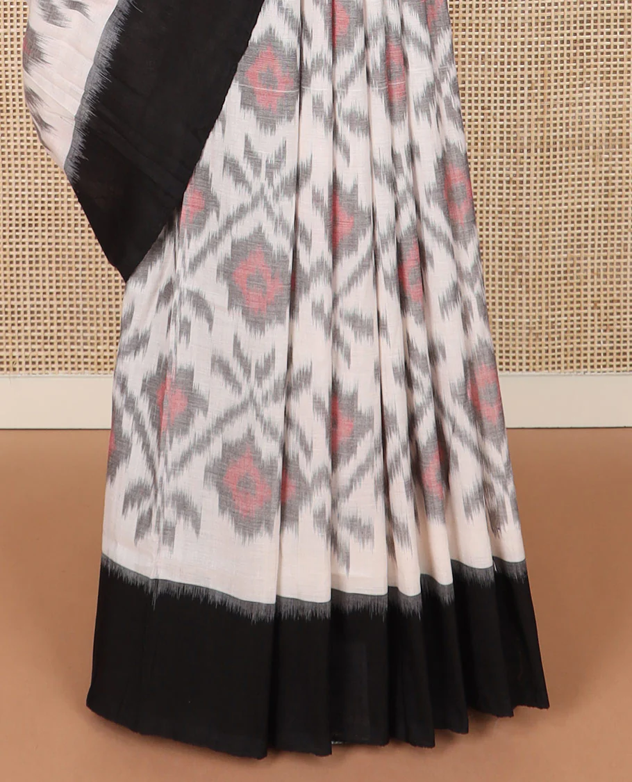 Half-white geometric design Pochampally ikkat saree, contrast plain black border, and ikkat design pallu - Image 4