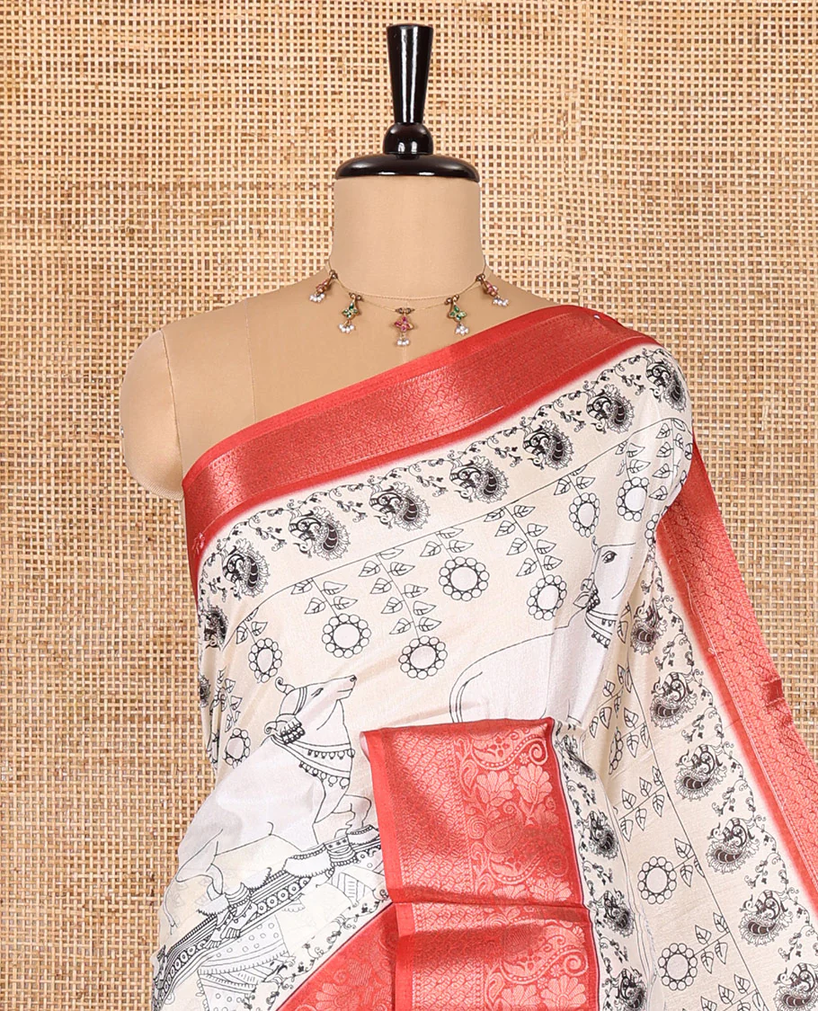 Half white kalamkari-style ancient human motifs printed dola saree with a contrast traditional zari design border, kalamkari printed pallu, and a matching blouse - Image 2