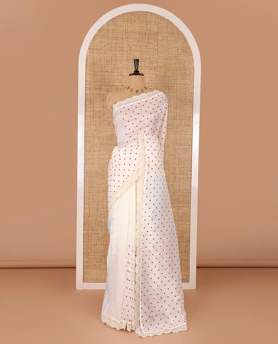 Half-white polka dots embroidered organza silk saree, scallop lace work border, and a matching lace bordered blouse - Image 2