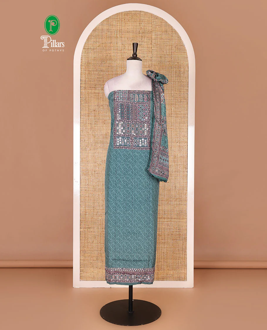 Hunter green material chudidar set, intricately printed with neck mirror work crepe top, Italian crepe bottom, and digital printed mirror work chinon dupatta