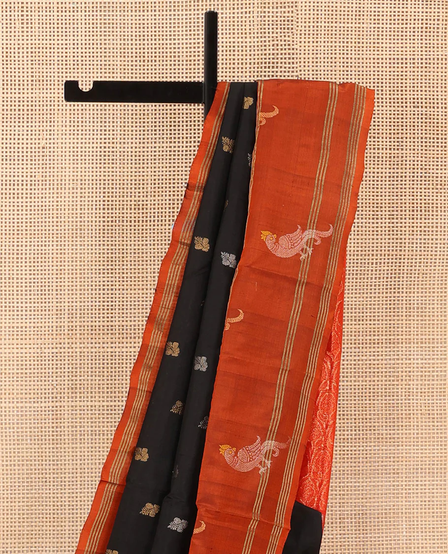 Inky Black Uppada Silk Saree Enlivened With Zari Buttas, Captivating Contrast Border Featuring Zari Stripes And Peacock Motifs, Pallu Depicting Rose Flower-Enclosed Mughal-Style Arches, And Paired With A Contrast Blouse - Image 3