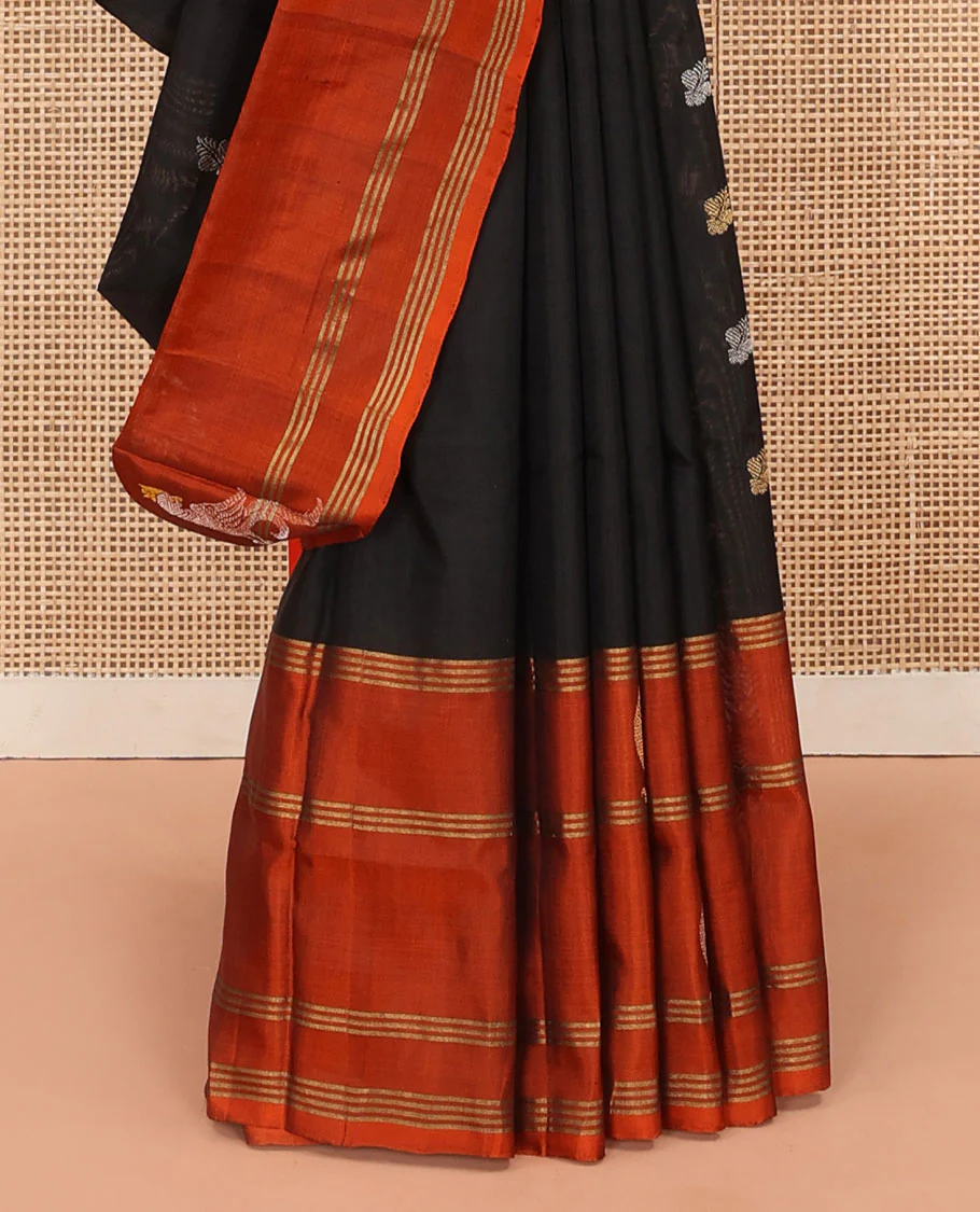 Inky Black Uppada Silk Saree Enlivened With Zari Buttas, Captivating Contrast Border Featuring Zari Stripes And Peacock Motifs, Pallu Depicting Rose Flower-Enclosed Mughal-Style Arches, And Paired With A Contrast Blouse - Image 4
