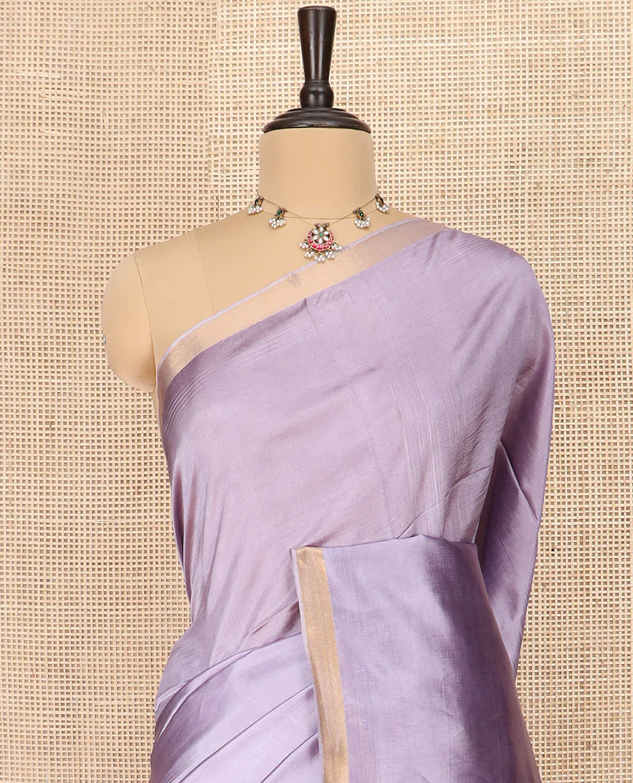 Lavender Plain Banana Pith Saree Subtly Sparkled with Zari Bavanji Border, Gleaming Zari Stripes Woven Pallu, and Paired with a Matching Plain Blouse - Image 2