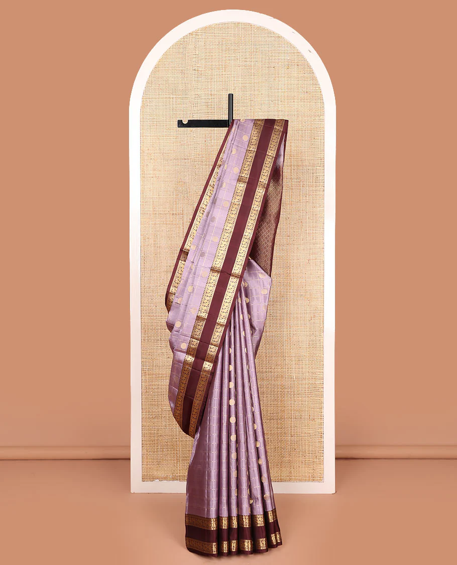 Lavender rudraksham butta enclosed checked Mayuri soft silk saree, contrast rettai pettu border of rekku, muthu, banaras, and mayil designs, and jaal pallu