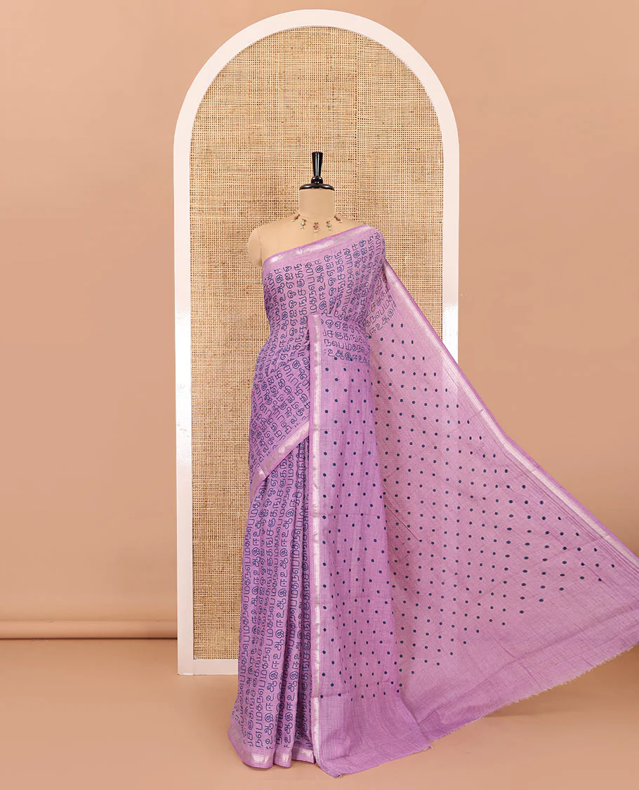 Lavender tamil letters printed soft cotton saree, zari piping border, small polka dotted pallu, and blouse of abstract and polka dots print