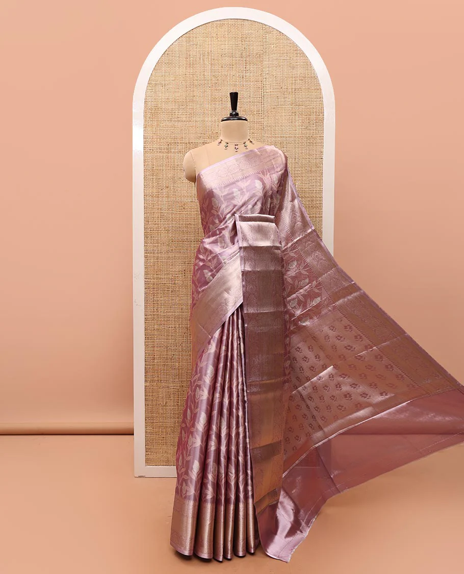 Lavender Tissue Silk Saree Adorned with Leaf Brocade in Rose Copper Zari, Featuring a Big Traditional Zari Design Border, Pallu Steeped with Floral Motifs, and Paired with a Matching Brocade Blouse