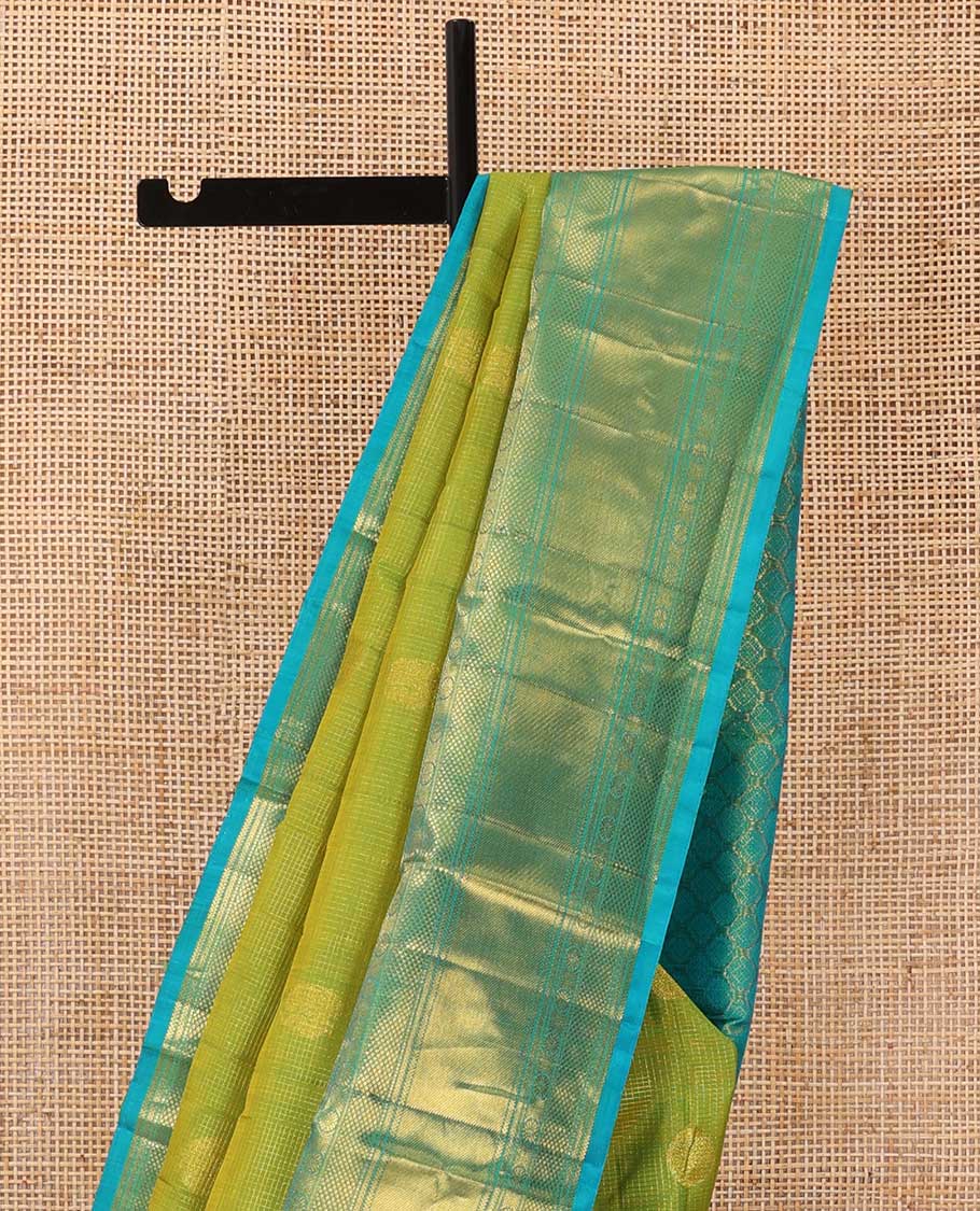 Leaf green zari buttas checked Kanchipuram silk saree, contrast border of ara bogudi,chakram and kuyil kann and jaal pallu - Image 4