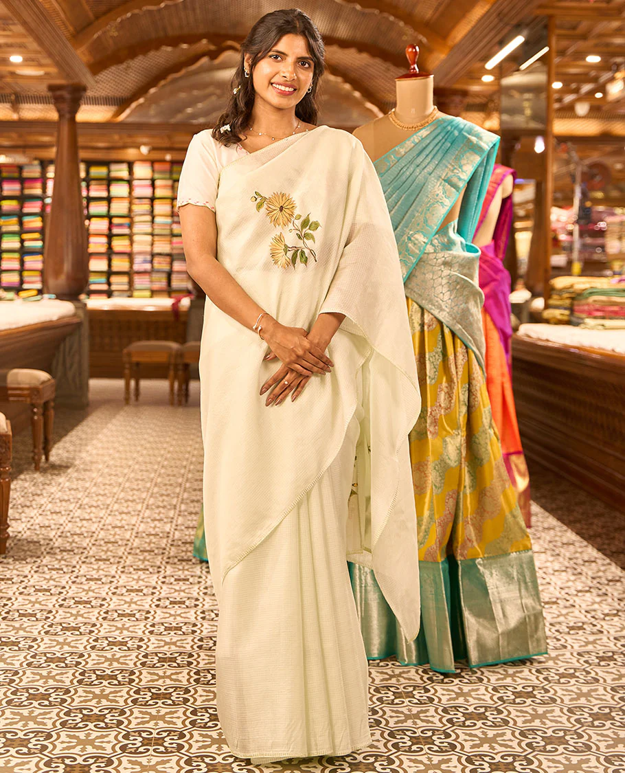 Borderless light blue floral motifs hand-brush painting style printed kota silk saree