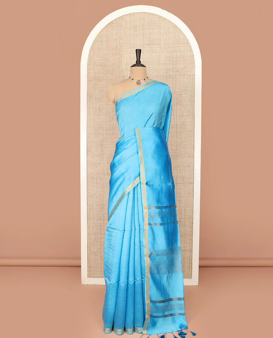 Light Blue Plain Banana Pith Saree Subtly Sparkled with Zari Bavanji Border, Gleaming Zari Stripes Woven Pallu, and Paired with a Matching Plain Blouse - Image 3