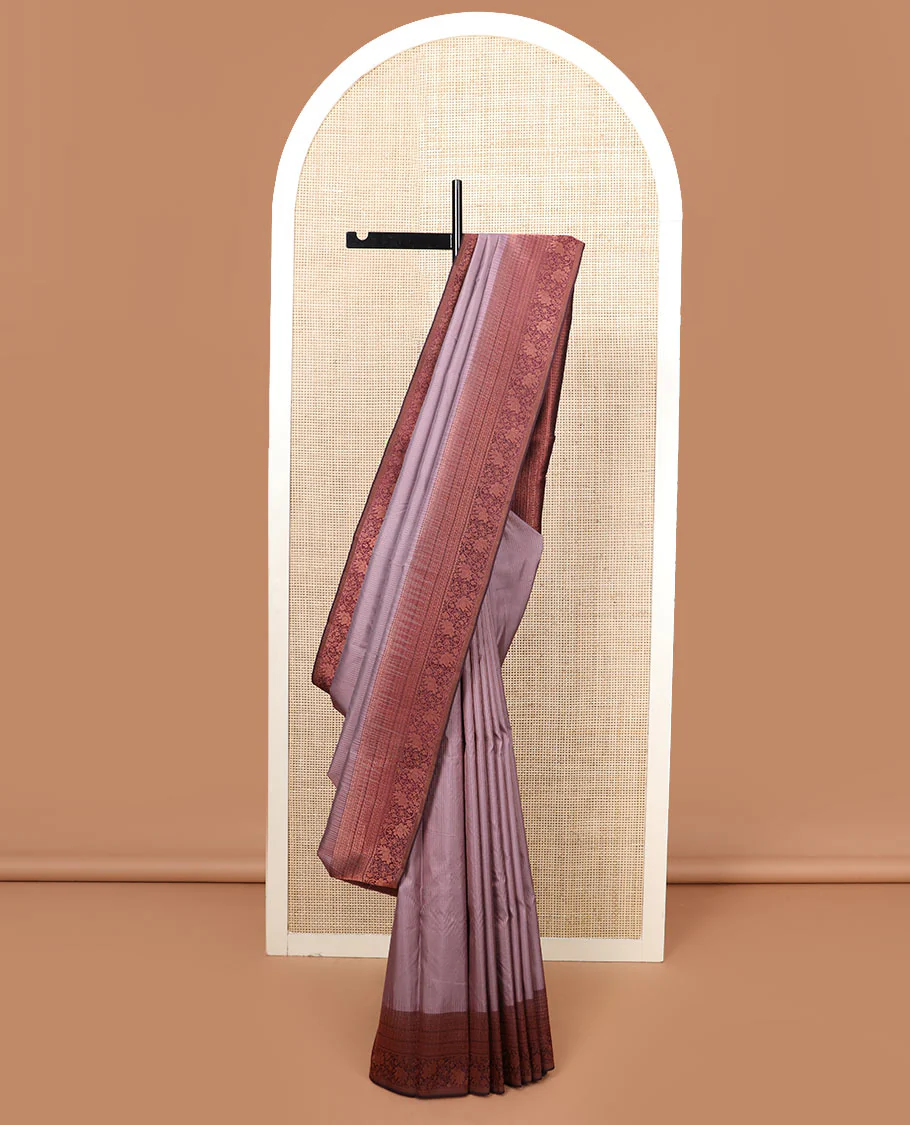 Light brown plain Vasundhara silk saree, contrast border of rekku, muthu, neli, and kodi visiry designs, and jaal pallu