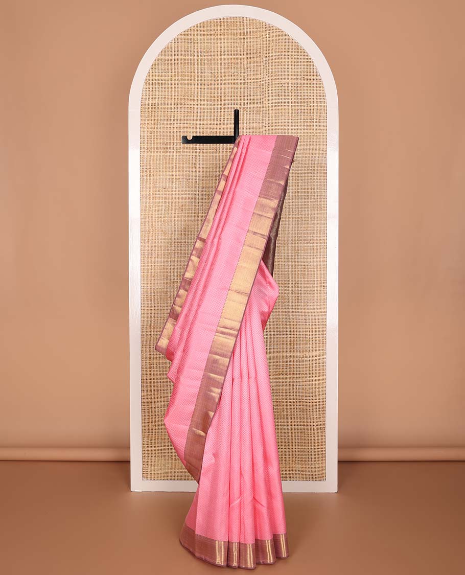 Light pink floral design Parampara silk saree with contrast border of thilakam mokku, paun, vanki design & floral pallu