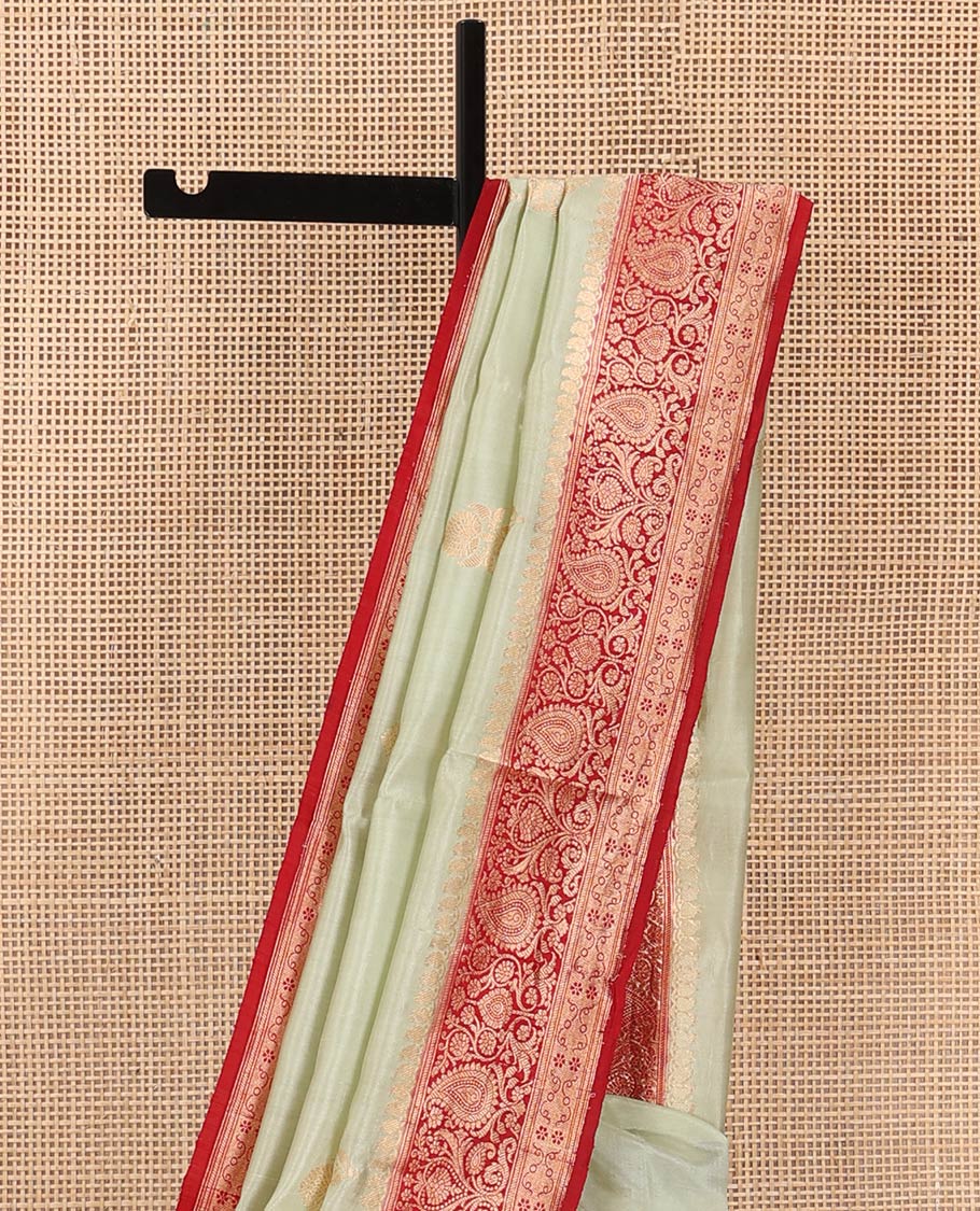 Light Sandal Raw Mango Silk Saree Beautified with Buttas, Featuring a Contrast Paisley Zari-Designed Border, a Zari-Elevated Jaal Pallu, Paired with a Contrast Blouse - Image 3