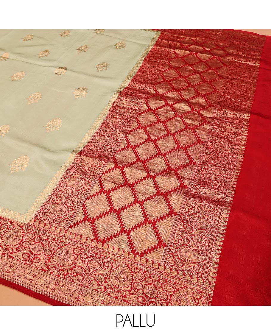Light Sandal Raw Mango Silk Saree Beautified with Buttas, Featuring a Contrast Paisley Zari-Designed Border, a Zari-Elevated Jaal Pallu, Paired with a Contrast Blouse - Image 5