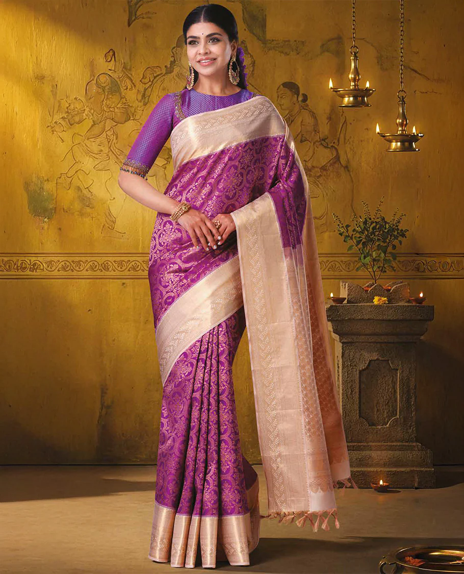 Magenta jacquard Kanchipuram wedding silk saree, contrast traditional zari border of leaf vine designs, and jaal pallu