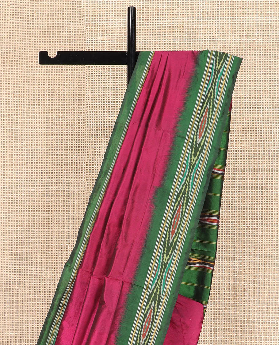 Magenta Plain Ikkat Silk Saree with a Contrast Green Border Complemented by a Hazy Ikkat Weave, Featuring a Pallu Flanked by Stripes and Ikkat Texture - Image 3