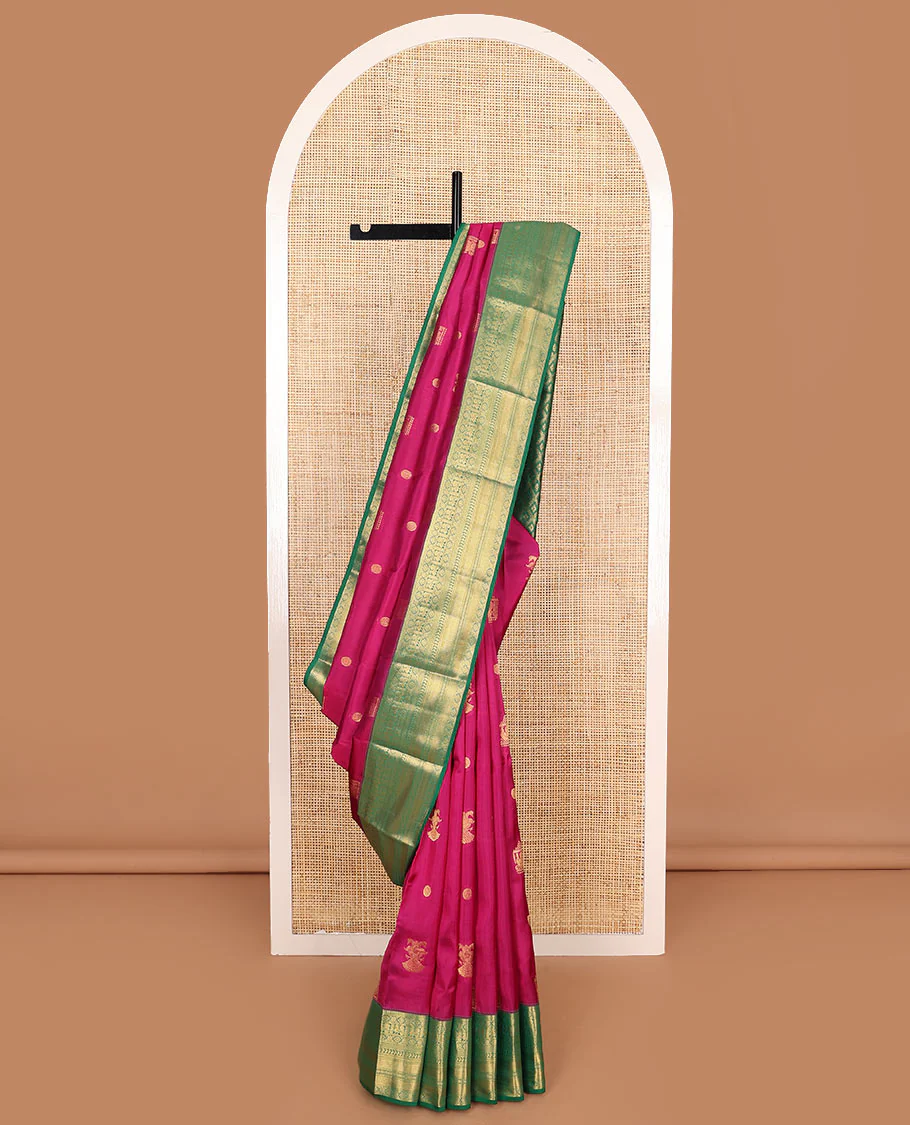 Magenta Vasundhara Lite Silk Mix Saree Enthralled with Mayil, Iruthalai Pakshi, and Chakram Designs, Highlighted with a Contrast Border of Mayil, Kamalam, Mayil Kann, Manga, Rudraksham, and Vanki Designs, Zari Elevated Jaal Pallu, and a Contrast Blouse