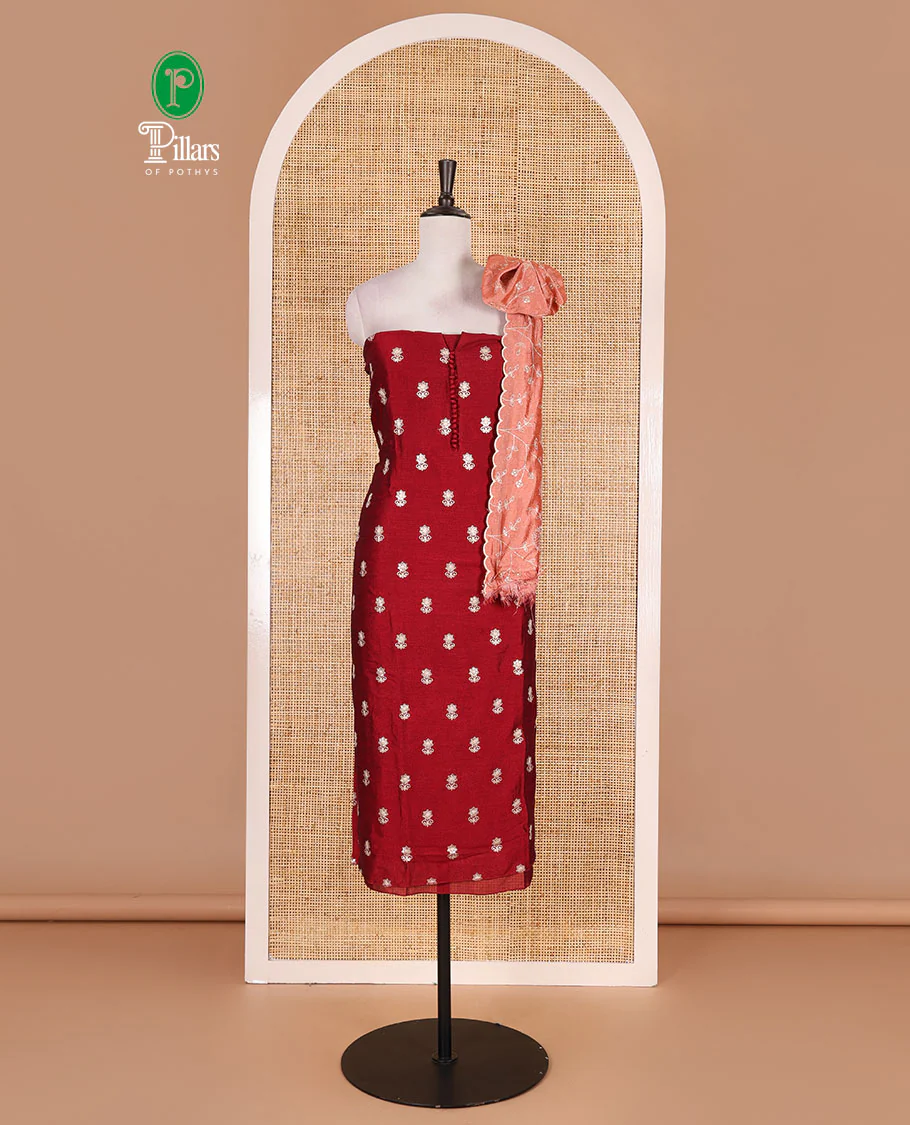 Magenta Vichitra silk material churidar set, floral motifs embroidered top, contrast Santoon bottom, and floral vine thread embroidered scallop dupatta