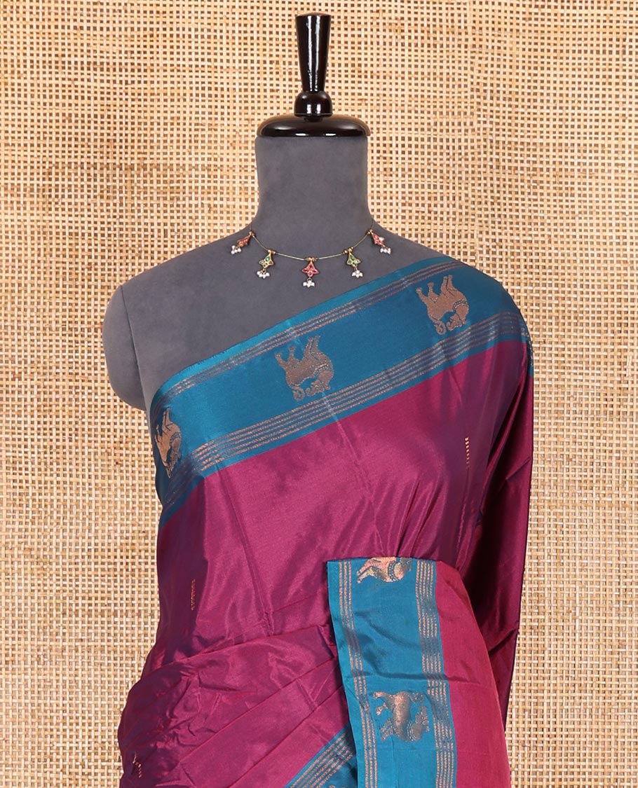 Magenta zari buttas Kanchi silk saree, contrast yaali motifs zari blue border, zari design pallu, and a matching blouse - Image 3