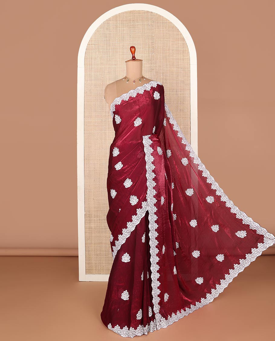 Maroon designer saree with silver embroidery thread, intricate motifs & scallop embroidery boder