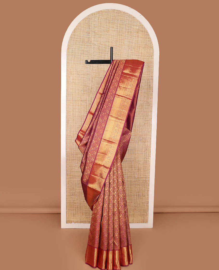 Maroon floral jaal jacquard Kanchipuram wedding silk saree, zari border of thilakam mokku, kathir, muthu, jaal, and floral designs, and jaal pallu