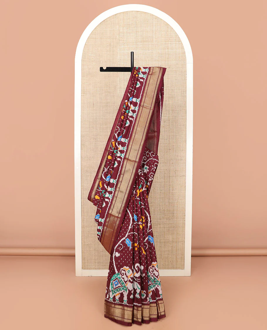 Maroon Ikkat Silk Saree with Colourful Elephant and Free-Style Ikkat Buttas, a Subtly Woven Zari Border, a Vibrantly Woven Pallu of Ikkat Patterns, and a Plain Blouse - Image 2