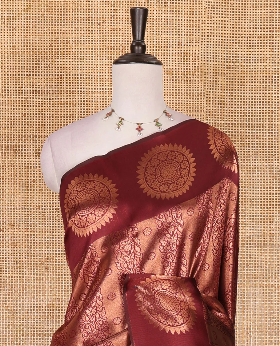 Maroon jacquard kanchi tissue saree, zari chakram motifs border, intricately zari woven pallu, and a matching zari design blouse - Image 3