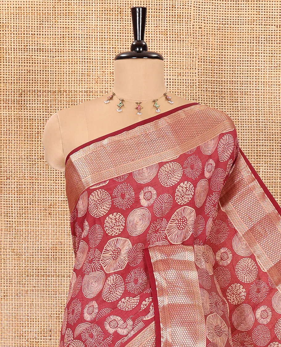 Maroon lotus-leaf style printed semi-tussar saree, traditional zari border, zari striped pallu, and a matching blouse - Image 2